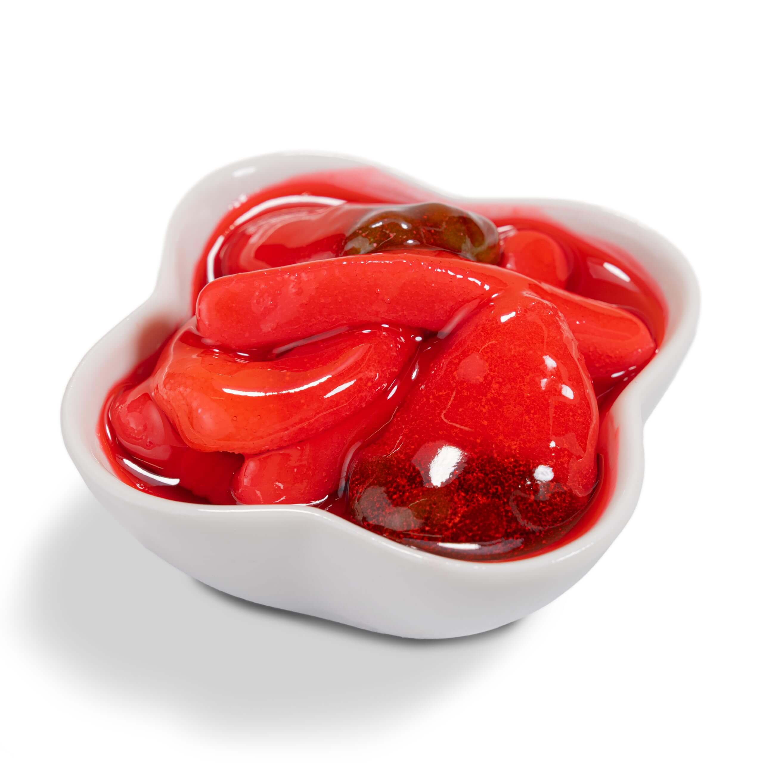 Viral Sour Gooey Gummies in a white bowl showcasing vibrant red strawberry flavored candy.