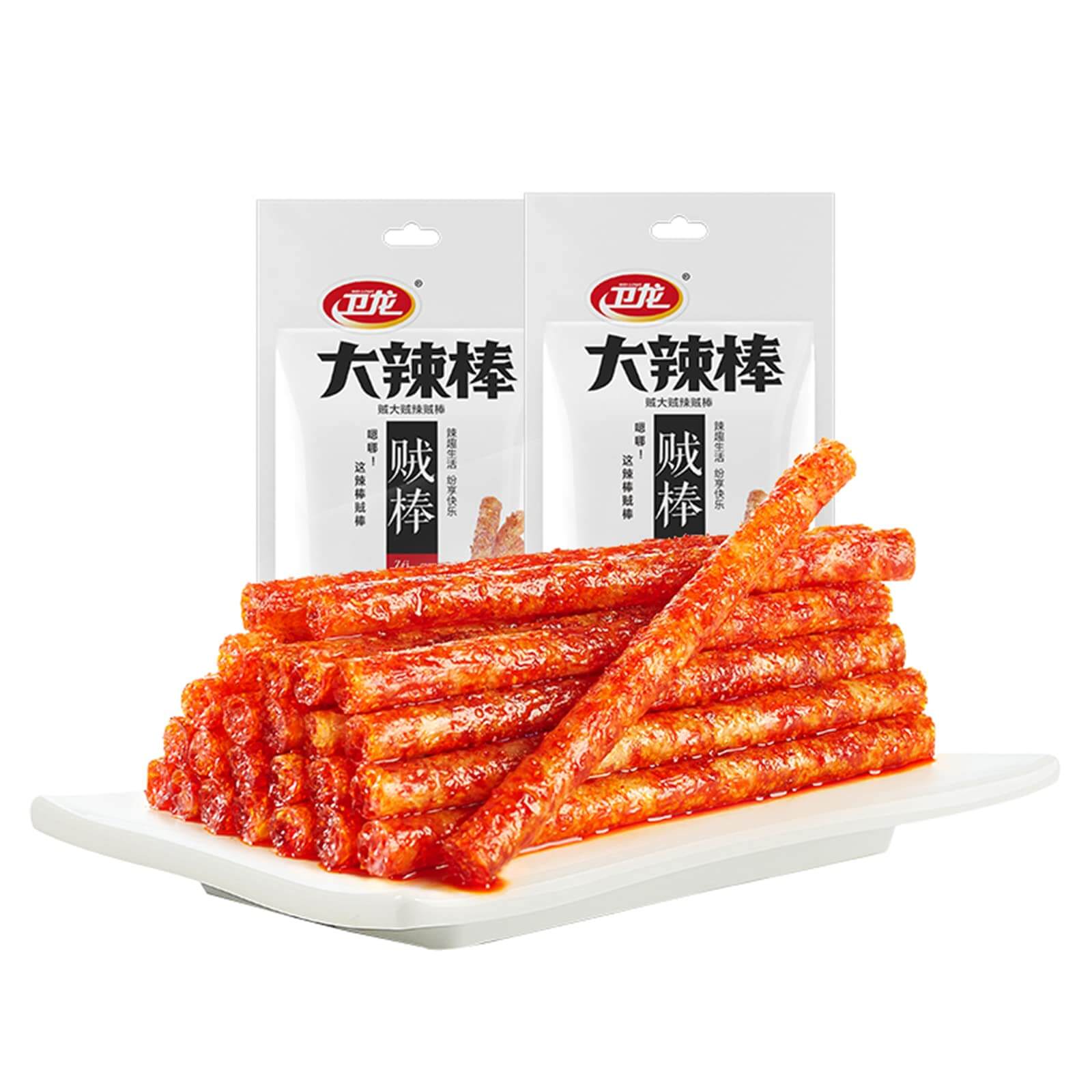 Chinese Spicy Latiao Gluten Strips stacked on a white plate with packaging in the background.