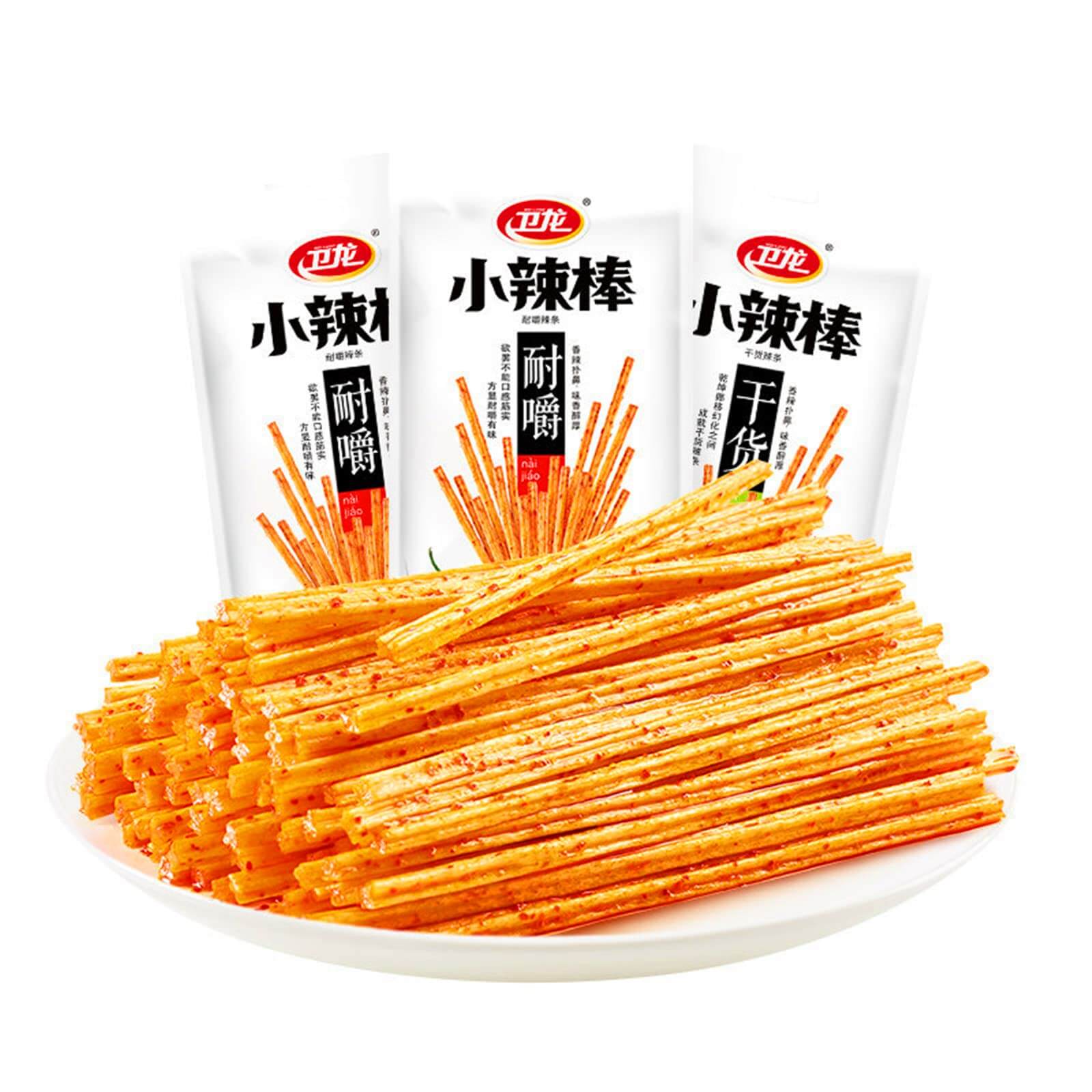 Chinese Spicy Latiao Gluten Strips on a plate with packaging in the background
